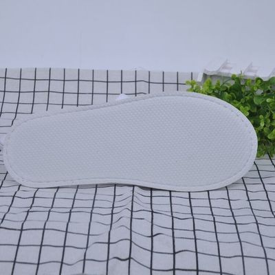 厂家供应酒店宾馆一次性拖鞋民宿客房用品白色包头防滑无纺布拖鞋图3