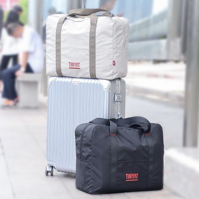 手提旅行包女大容量折叠收纳包男士短途出差防水行李包travel bag