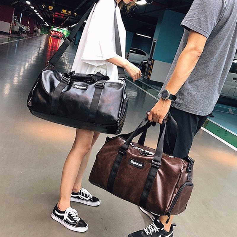 跨境2021新款行李包女手提男大容量行李袋韩版出差登机健身旅行包图2