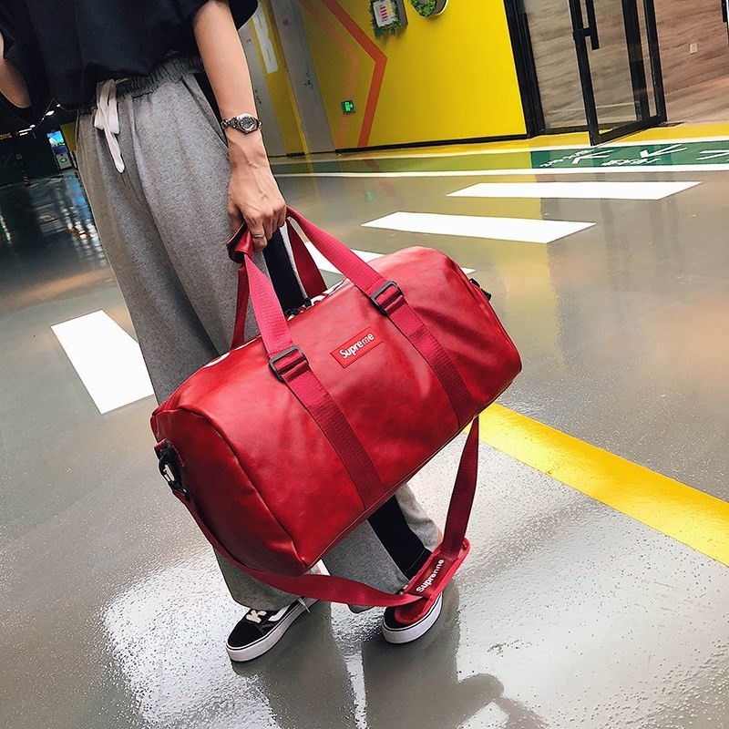跨境2021新款行李包女手提男大容量行李袋韩版出差登机健身旅行包图3