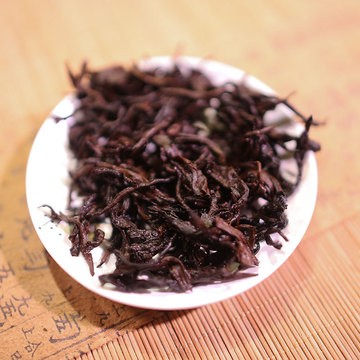 普洱茶原产地2016年冰岛古树纯料普洱熟茶饼三年干仓茶厂家直销图3