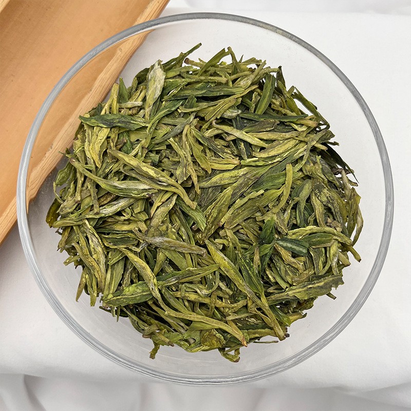 园区直供绿版龙井茶人工采摘雨前春季龙井茶牛皮纸包装绿茶批发图5