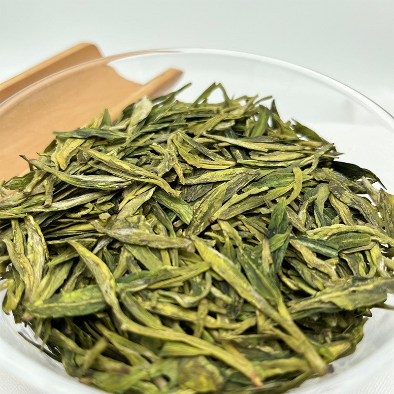 园区直供绿版龙井茶人工采摘雨前春季龙井茶牛皮纸包装绿茶批发图2